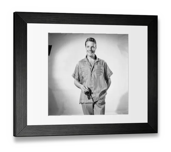 Framed Print : Man wearing shorts sleeve shirt. 1960
