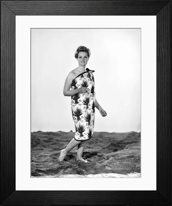 Framed Print : Model Roma Reeves wearing beach toga that doubles as a beach towel. May 1962