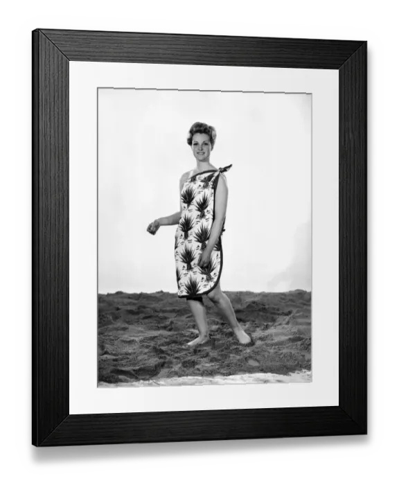 Framed Print : Model Roma Reeves wearing beach toga that doubles as a beach towel. May 1962