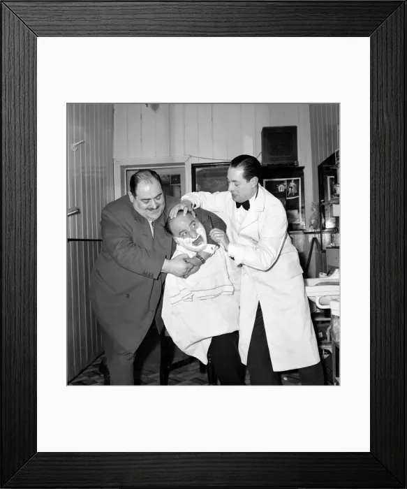 Framed Print : Mens Barbers Shop: Mr. Thomas the barber seen here having a joke with some of his Framed Print : Mens Barbers Shop: Mr. Thomas the barber seen here having a joke with some of his