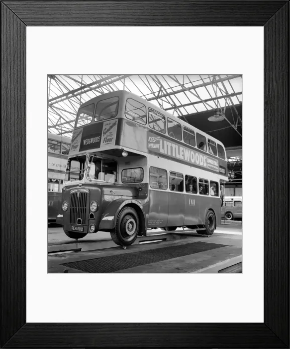 Framed Print : Bus balanced on Cups from the Josiah Wedgewood and Son fine China company to demonstrate