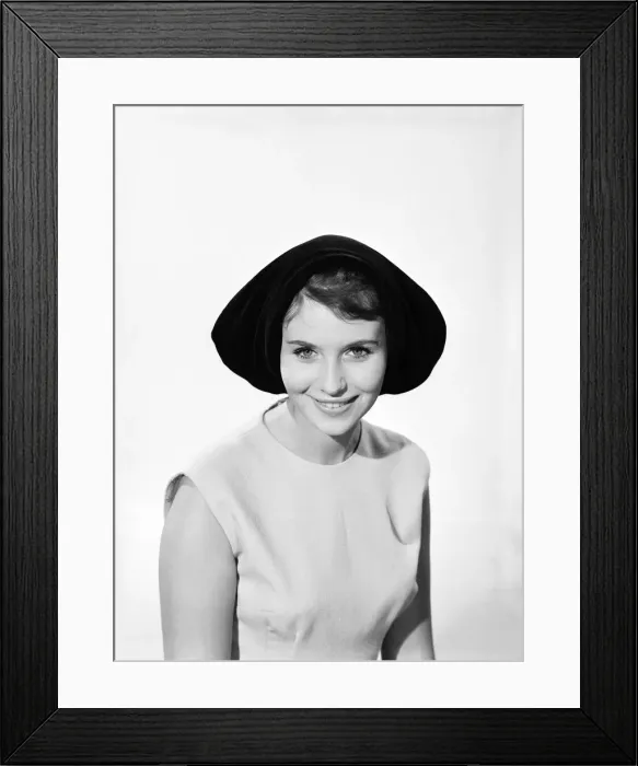 Framed Print : Model Ann Cave wearing a collection of spring and summer hats. Circa 1962 Framed Print : Model Ann Cave wearing a collection of spring and summer hats. Circa 1962