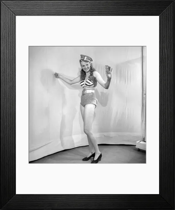 Framed Print : Woman wearing fancy dress bus condutors uniform. 1959
