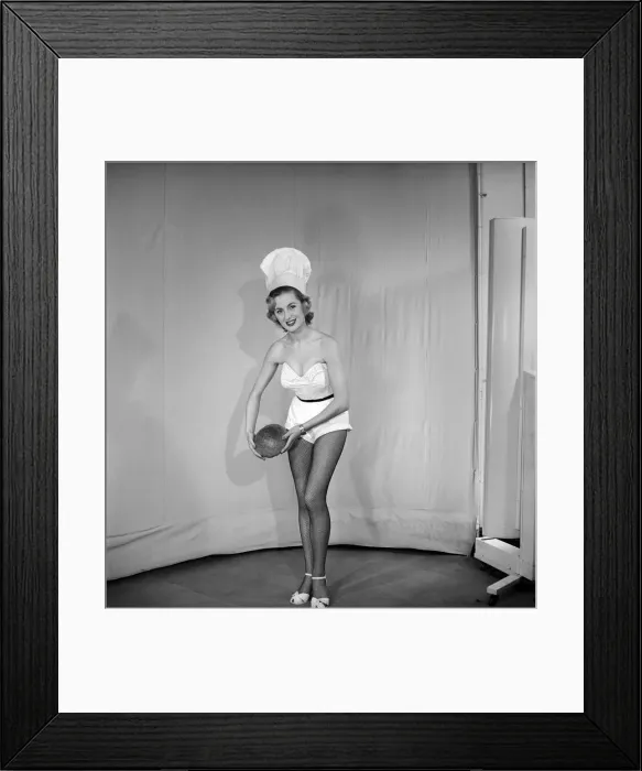 Framed Print : Woman wearing chefs hat holding loaf of bread. 1959 E61-005 Framed Print : Woman wearing chefs hat holding loaf of bread. 1959 E61-005