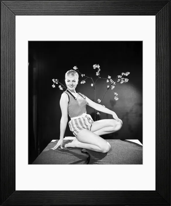 Framed Print : Ruth Calvert seen here modelling the latest 1959 springtime fashions posing with blossom