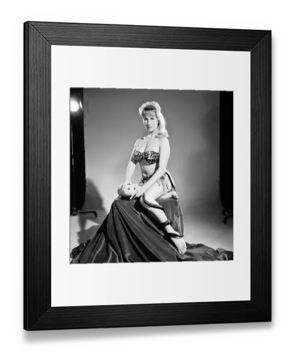 Framed Print : Model Carol Gardener as Eve about to take a bite from the apple. 1960 E421-011 Framed Print : Model Carol Gardener as Eve about to take a bite from the apple. 1960 E421-011