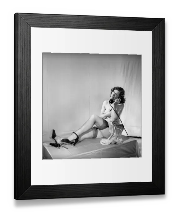 Framed Print : Woman wearing stockings seen here on the telephone. 1959 Framed Print : Woman wearing stockings seen here on the telephone. 1959