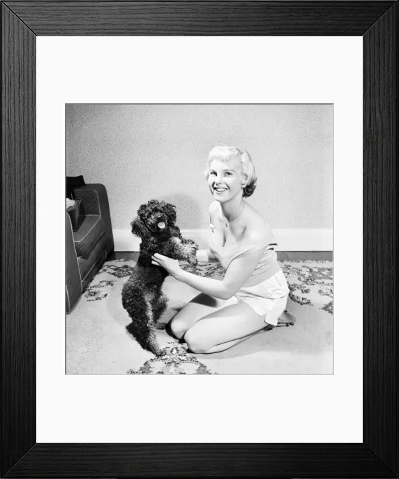 Framed Print : Pat Bolton seen here with her pet poodle dog. 1964 E298-005