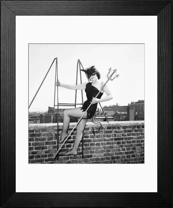 Framed Print : Women dressed as She Devil. Model: Pamela Dennis. May 1957 E270-003