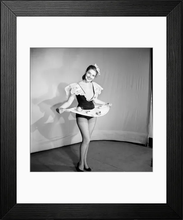 Framed Print : Woman wearing a skirt that is also a tray, seen here with tea pot and cups on the tray Framed Print : Woman wearing a skirt that is also a tray, seen here with tea pot and cups on the tray