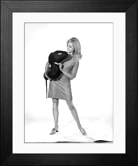 Framed Print : Model Anna Maria Greaves with Roly dog soft toy and draft excluder. 1959 D169-008 Framed Print : Model Anna Maria Greaves with Roly dog soft toy and draft excluder. 1959 D169-008