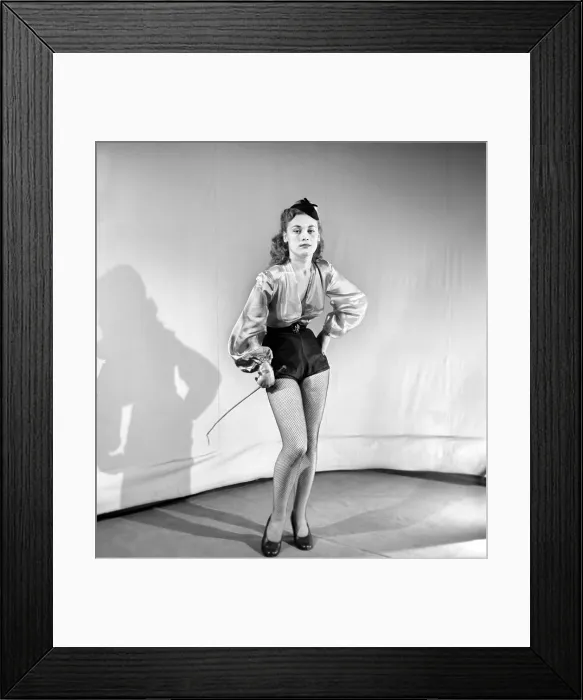 Framed Print : Woman wearing fancy dress jockey outfit. 1959 Framed Print : Woman wearing fancy dress jockey outfit. 1959