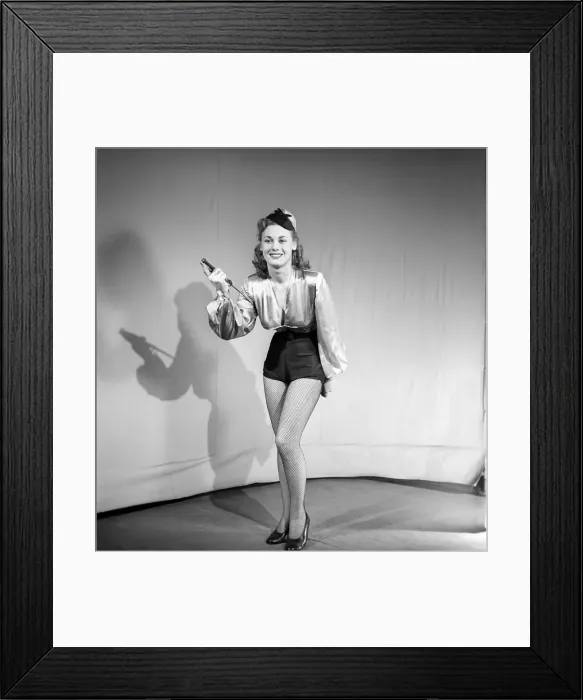 Framed Print : Woman wearing fancy dress jockey outfit. 1959