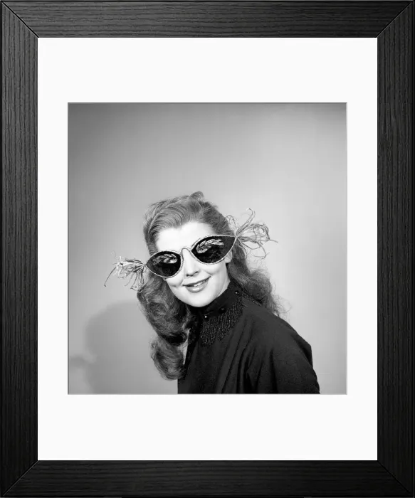 Framed Print : Woman wearing face masks. February 1953