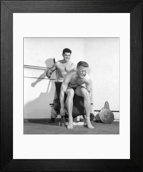 Framed Print : Mens Health: Body builder Larry Stevens seen here with his training coach exercising Framed Print : Mens Health: Body builder Larry Stevens seen here with his training coach exercising