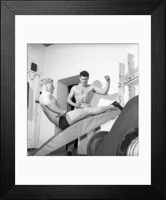 Framed Print : Mens Health: Body builder Larry Stevens seen here with his training coach exercising Framed Print : Mens Health: Body builder Larry Stevens seen here with his training coach exercising