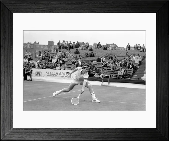 Framed Print : American tennis star John McEnroe in action at Queens Club. June 1980 Framed Print : American tennis star John McEnroe in action at Queens Club. June 1980