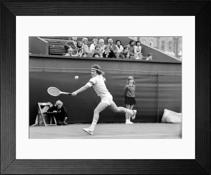 Framed Print : American tennis star John McEnroe in action at Queens Club. June 1980 Framed Print : American tennis star John McEnroe in action at Queens Club. June 1980
