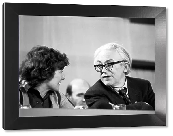 Labour politician Michael Foot talks to Barbara Castle during a debate on the Common