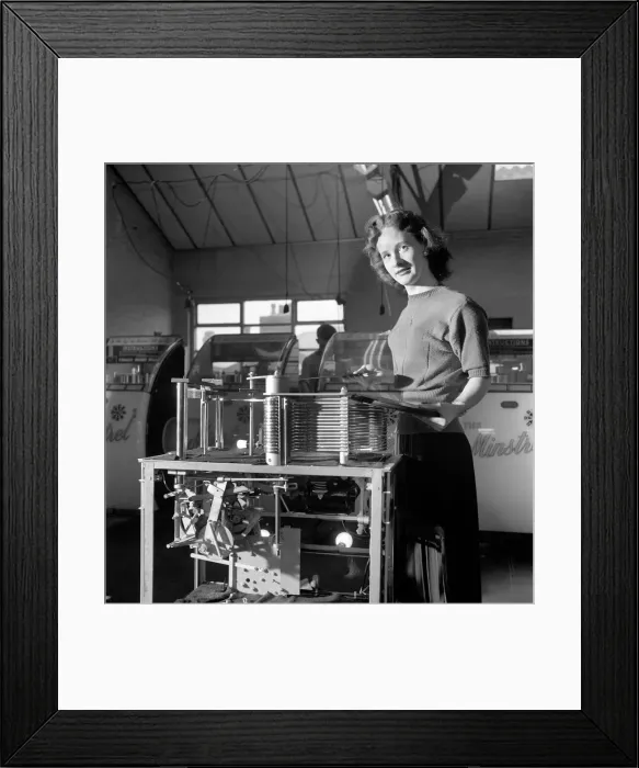 Framed Print : Kathleen Craig juke box queen who selects records for jukeboxes. 1956 A516-003 Framed Print : Kathleen Craig juke box queen who selects records for jukeboxes. 1956 A516-003