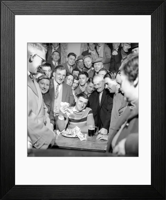 Framed Print : Miner Joe Steele seen here taking part in a food eating competition