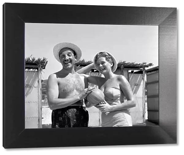 Holidays: Couples enjoying the beach on Corsica. August 1957 A503a-007