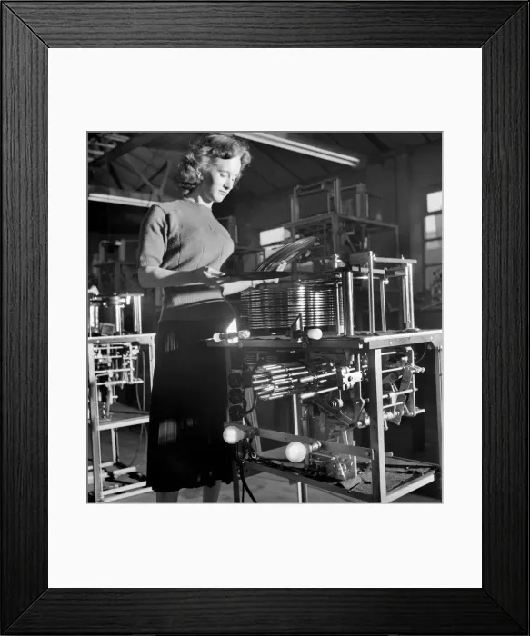 Framed Print : Kathleen Craig juke box queen who selects records for jukeboxes. 1956 A516-001