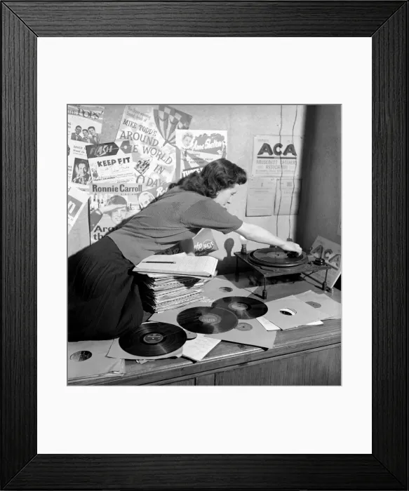 Framed Print : Kathleen Craig juke box queen who selects records for jukeboxes. 1956 A516-013 Framed Print : Kathleen Craig juke box queen who selects records for jukeboxes. 1956 A516-013