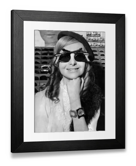 Framed Print : Woman wearing Bonnie and Clyde'sunglasses. February 1968 Framed Print : Woman wearing Bonnie and Clyde'sunglasses. February 1968