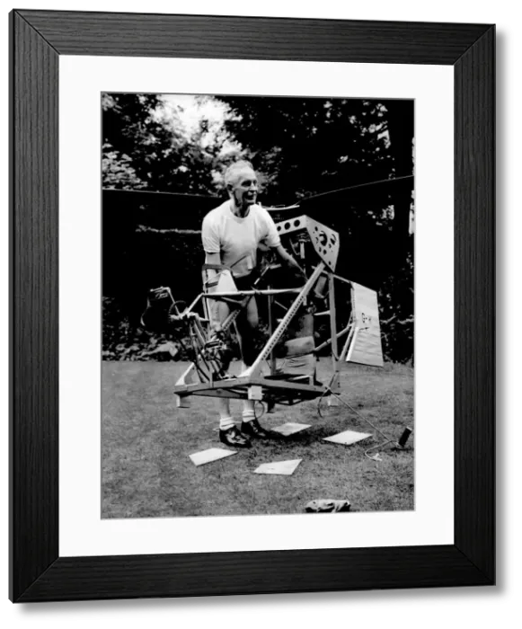 Framed Print : Mr. Harry Killick carries his home built man powered helicopter back to his workshop Framed Print : Mr. Harry Killick carries his home built man powered helicopter back to his workshop