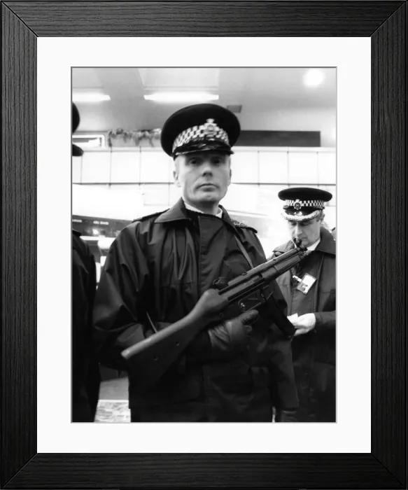 Framed Print : Police with machine guns at Heathrow airport. January 1986 Framed Print : Police with machine guns at Heathrow airport. January 1986