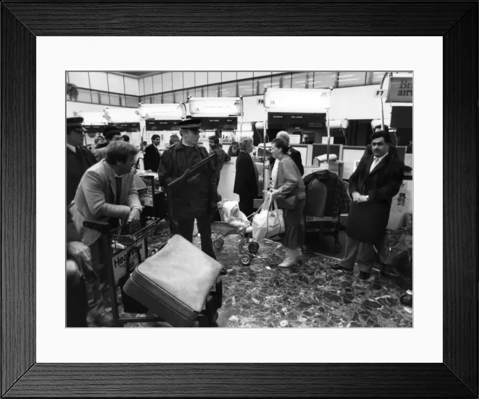 Framed Print : Police with machine guns at Heathrow airport. January 1986 Framed Print : Police with machine guns at Heathrow airport. January 1986