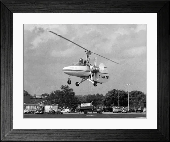 Framed Print : John Judge, a test pilot seen here at the controls of his Wallis autogyro shortly before
