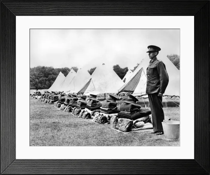 Framed Print : A soldier stands to attention beside neatly folded kit during an inspection of 52nd Framed Print : A soldier stands to attention beside neatly folded kit during an inspection of 52nd