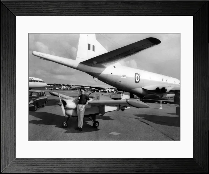 Framed Print : The Nipper a case of the large and the small at Farnborough, Hampshire Framed Print : The Nipper a case of the large and the small at Farnborough, Hampshire