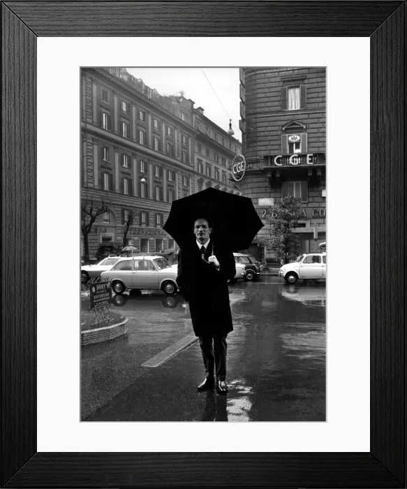 Framed Print : Henry Cooper in Italy: Henry Cooper pictured in the rain on the Via Veneto Framed Print : Henry Cooper in Italy: Henry Cooper pictured in the rain on the Via Veneto