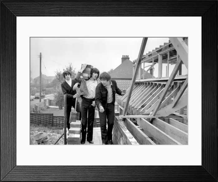 Framed Print : The Troggs, pop group help to build a house for one of their members Framed Print : The Troggs, pop group help to build a house for one of their members
