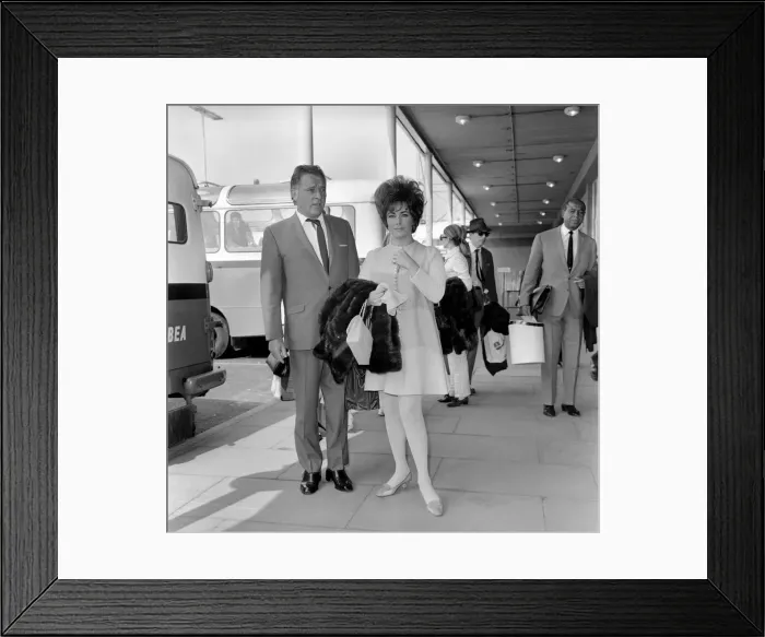 Framed Print : Elizabeth Taylor and Richard Burton at Heathrow Airport. April 1967
