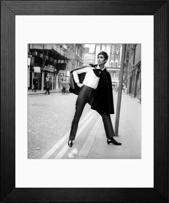 Framed Print : Model from the Rhona Roy fashion show at the Talk of the Town models a velvet cape