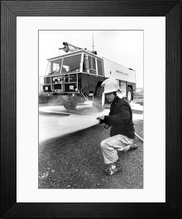 Framed Print : Fireman Bob Ford with the new fire engine at Newcastle Airport Framed Print : Fireman Bob Ford with the new fire engine at Newcastle Airport