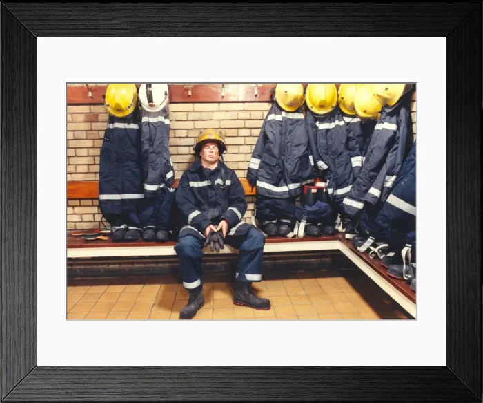 Framed Print : Australian exchange firefighter Craig Theisinger is absolutely exhausted after finishing