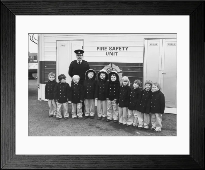 Framed Print : Fire safety unit Sub officer Graham Shiel with children at Southridge First Shcook Framed Print : Fire safety unit Sub officer Graham Shiel with children at Southridge First Shcook