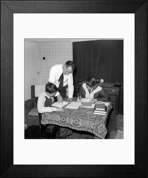 Framed Print : Family Life: Mr. John Theakeston seen here helping his two sons with their school Framed Print : Family Life: Mr. John Theakeston seen here helping his two sons with their school