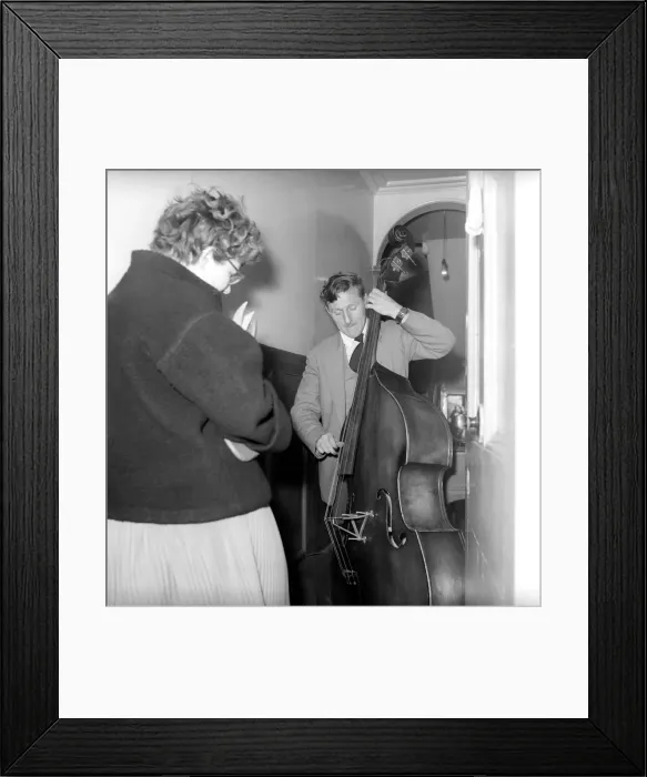 Framed Print : Occupation: Busker: Johnny Hawksworth seen here busking with his Double Bass in Central Framed Print : Occupation: Busker: Johnny Hawksworth seen here busking with his Double Bass in Central