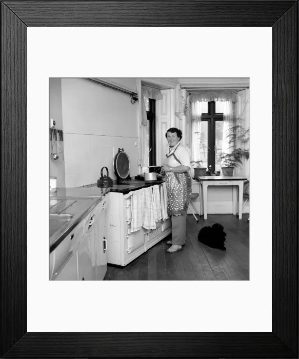 Framed Print : Mrs. Moss in the kitchen cooking. 1954 A145c