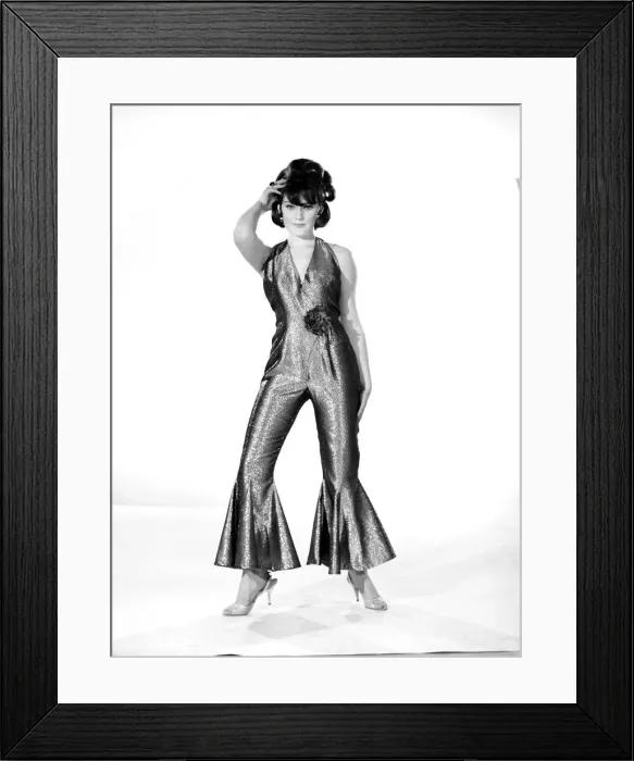 Framed Print : Model Rita Royce wearing lurex suit. Circa 1963