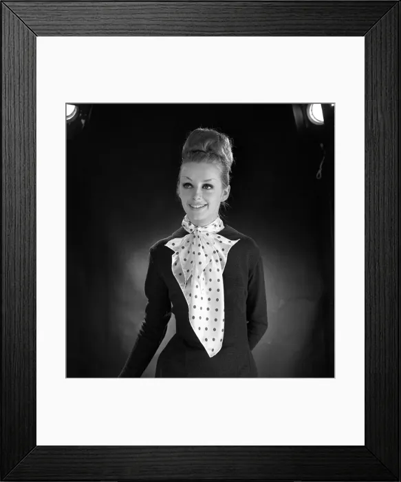 Framed Print : Woman wearing Berlin scarf. January 1964