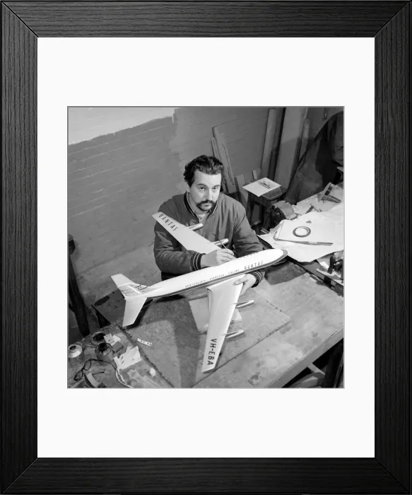 Framed Print : Factory where model aircraft for the travel agents are made. Men making model planes Framed Print : Factory where model aircraft for the travel agents are made. Men making model planes
