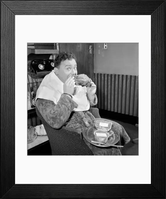 Framed Print : Actor and singer Harry Secombe seen here ordering and then eating a meal order from