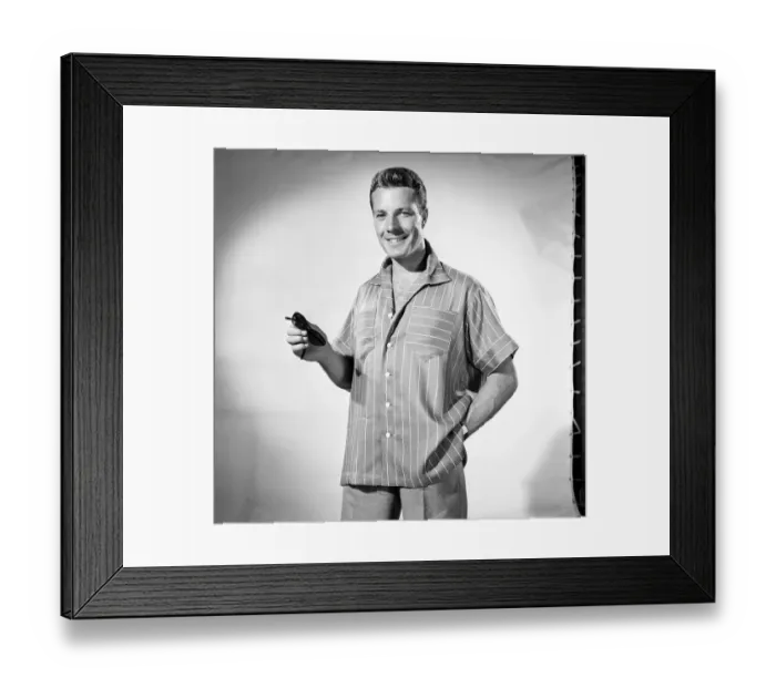 Framed Print : Man wearing shorts sleeve shirt. 1960